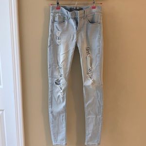 Express mid rise light wash skinny jeans